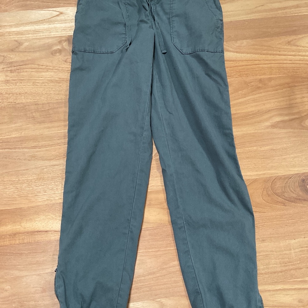 Women’s cargo utility pants with zippers at ankles
